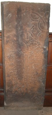 An old gravestone in the porch of St Andrew's - Penrith Town, Cumbria, Northern England