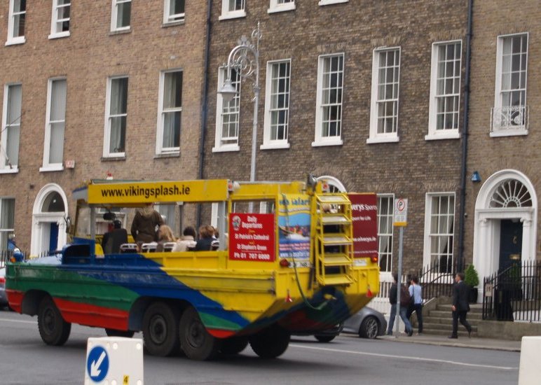 50. The Viking Splash tour of Dublin's streets and waterways via a WW2 refurbished amphibious vehicle passing Georgian houses near Merrion Square
