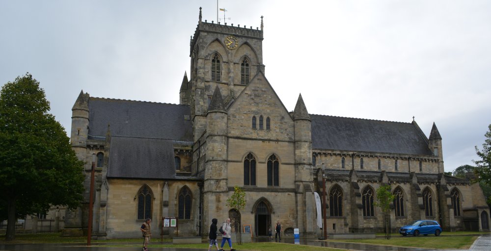 The origins of the church date back to 1114 with many subsequent developments. The central tower was added in 1365.