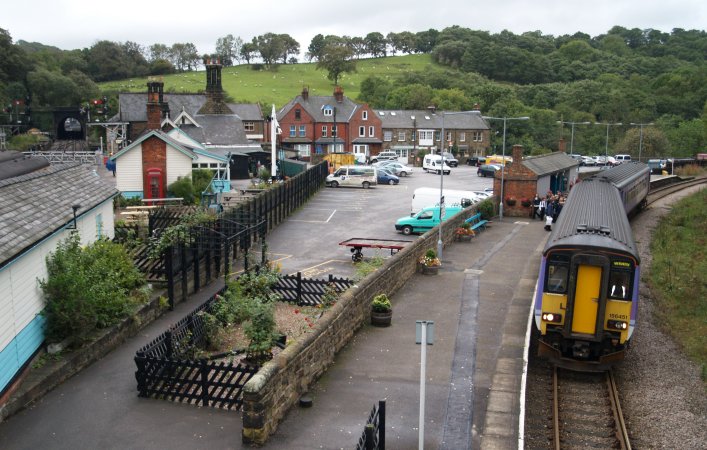 Location 14a: Grosmont Station. The platform on the right serves the Whitby-Middlesbrough line (Northern Rail in 2007). On the left are the platforms and signals of the North Yorkshire Moors Railway for the steam trains to Goathland, which exit Grosmont through the tunnel (in the top left of the picture ) to Goathland, Levisham and Pickering, a major tourist attraction of the North York Moors National Park.