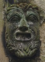 carved faces on the north wall of Helmsley Parish Church