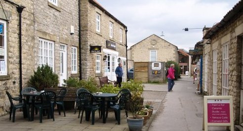 Just off Bridge Street is a small 'arcade' with cafe, shops and the Art Centre in the Old Meeting House (straight on). It was built in 1812 as a meeting place for Quakers.