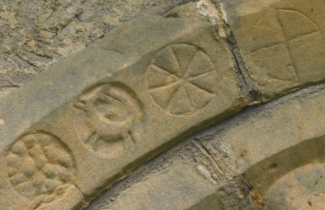 Detail of carving on the arch of the disused north doorway.