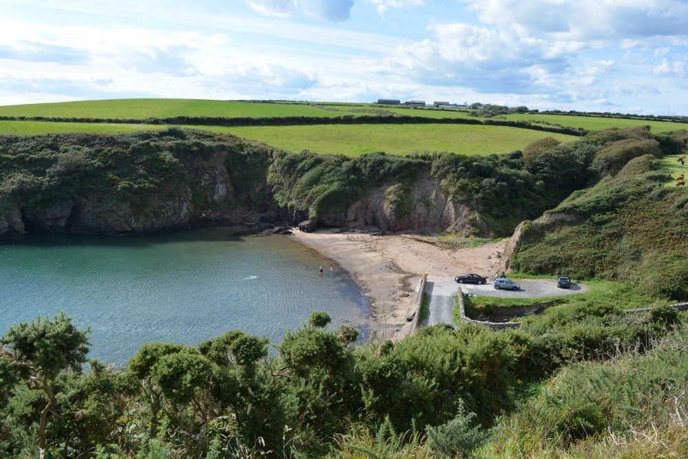 Further along is the small beach and inlet of Ballymacaw on the Dunmore East coastal footpath Co. Waterford Ireland