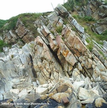 Angled rocks on Dunree Beach
