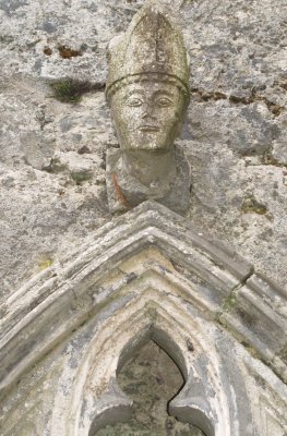 Carving of Bishop's head in the chancel - St Fachtnan's Cathedral & Crosses, Kilfenora, The Burren, County Clare, West of Ireland