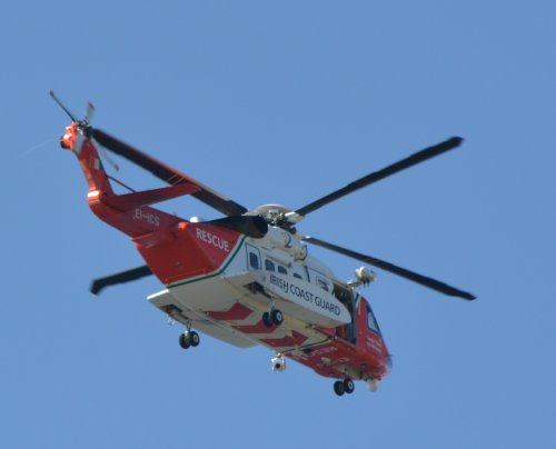 The coastguard search and rescue helicopter viewed from the Dunmore East coastal footpath