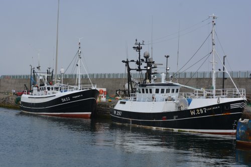 Fishing vessels DA22 Argonaut IV (a trawler) and W297 Caronia II in Dunmore East harbour, Co. Waterford, Ireland