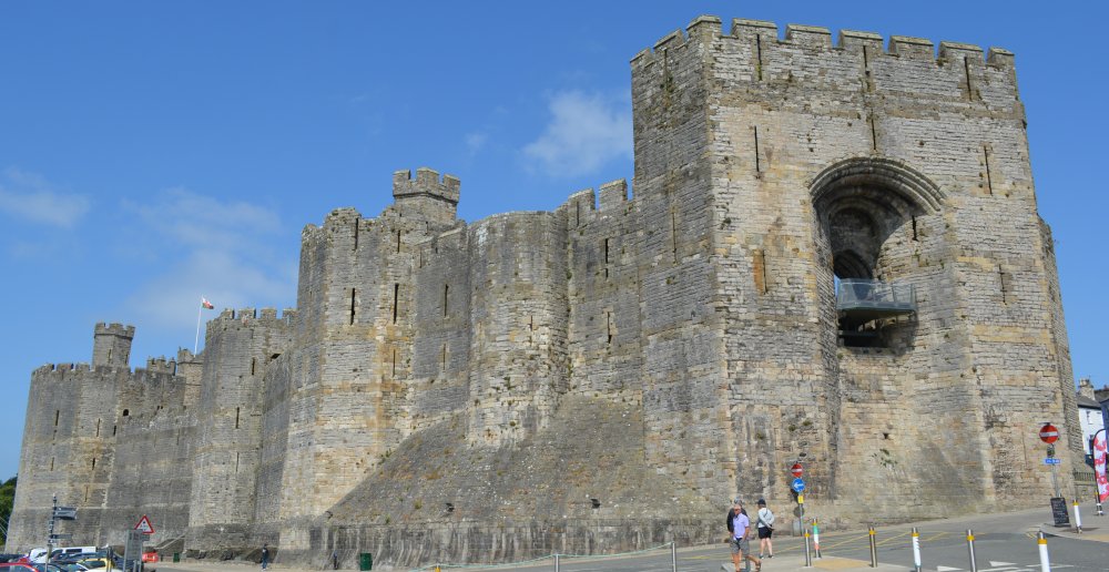 Castle was started in the late 11th century, and the original building was replaced in the reign of King Edward I to give much of the mighty fortress you see today.  Caernarfon, North Wales