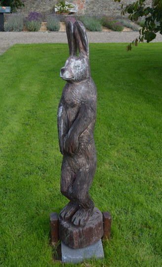 wooden sculpture of an Irish hare Vandeleur Walled Garden and Visitor Centre near Kilrush, Co. Clare, Ireland
