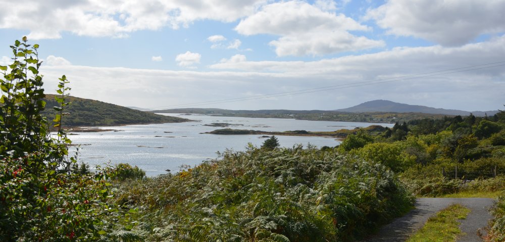 Looking down on the coastal scenery of Cashel climbing up road from the church Cashel, Connemara, Co. Galway, Ireland