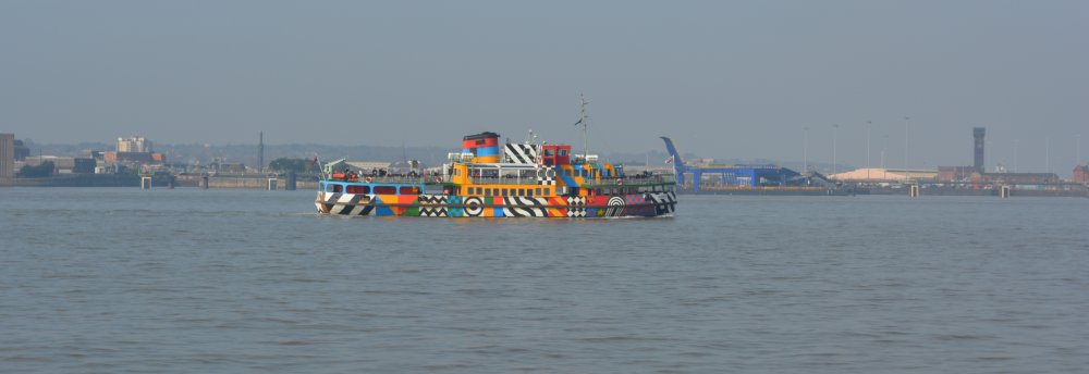 The very colourful MV SNOWDROP (once named MV Woodchurch) known as the Dazzle Ferry currently operating the commuter and river cruise services in 2022