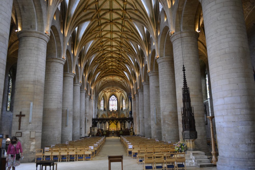 general view east down the nave of Tewkesbury Abbey Gloucestershire England