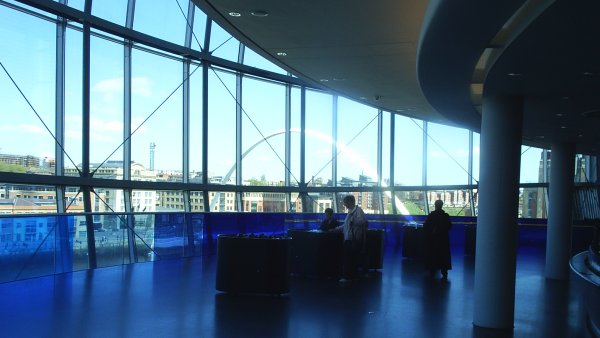 The blue coloured glass of the Sage with the Millennium Bridge in the background