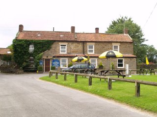 The Horseshoe Inn is in the village of Levisham north of Pickering on the North York Moors, North Yorkshire, England