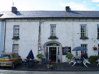 The budget 'Old Schoolhouse' River Cafe on the banks of the River Nore - Inistioge, County Kilkenny, Ireland