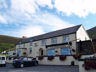 Tig Slea Head Cafe has a commanding view of Slea Head and the Blasket Islands on the Dingle Peninsula, County Kerry Ireland. The circular tour of this part of the coast is very popular and its the only tearoom for miles!