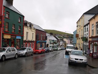 The main higher street in Dingle, full of colourful shops, pubs and cafe's