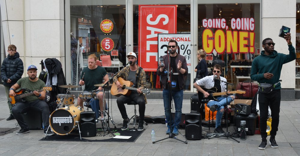 Irish folk & rock band Keywest playing busking in Church Street, Liverpool 