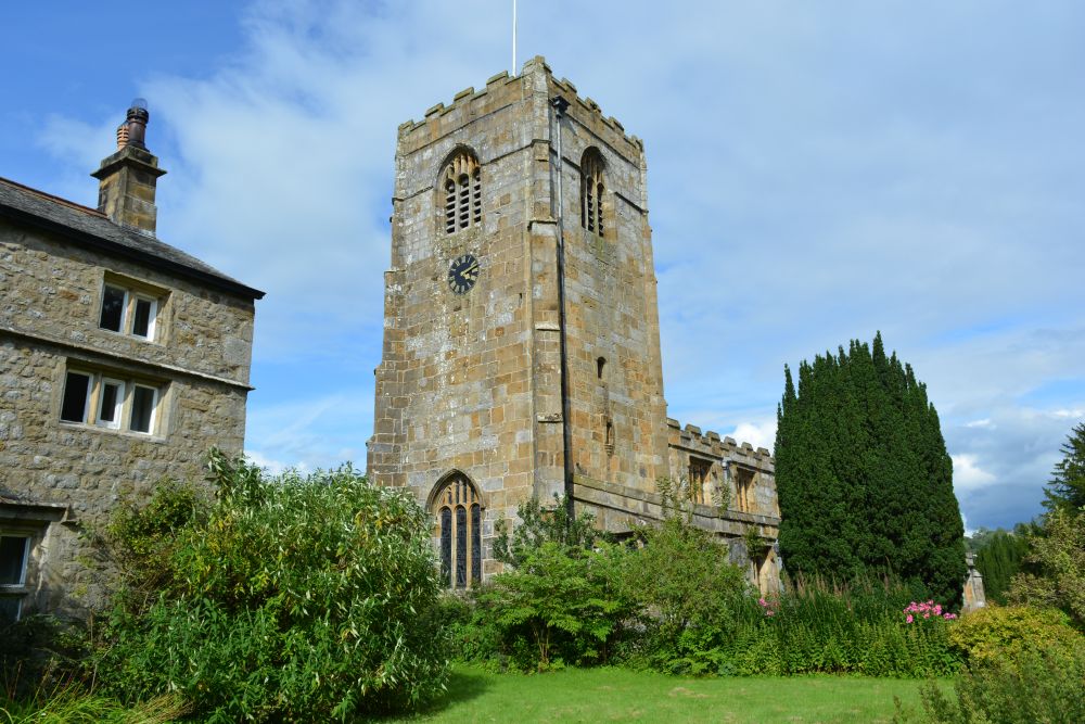 graveyard, tower and west end of St Michael's Church, Kirkby Malham, North Yorkshire