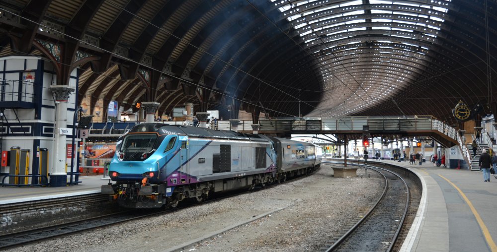 Class 68 diesel locomotive 68027 Splendid at the rear of a Scarborough - Liverpool TransPennine service