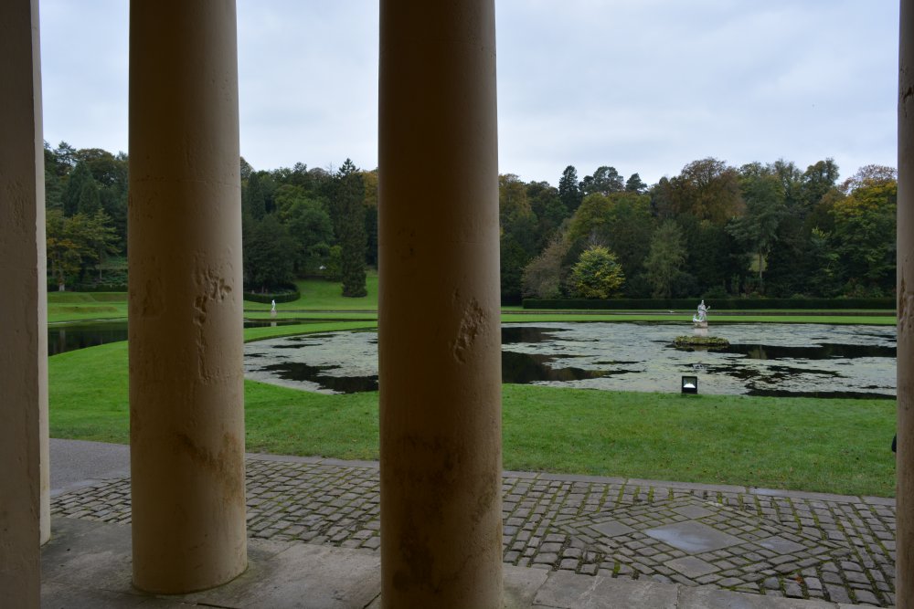 Looking out from the Temple of Piety onto the Moon Pool Studley Royal walks park gardens in Autumn
