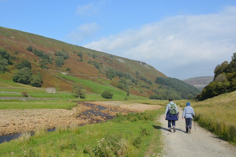 friends walking to Muker to Keld Walk, Swaledale, North Yorkshire, England