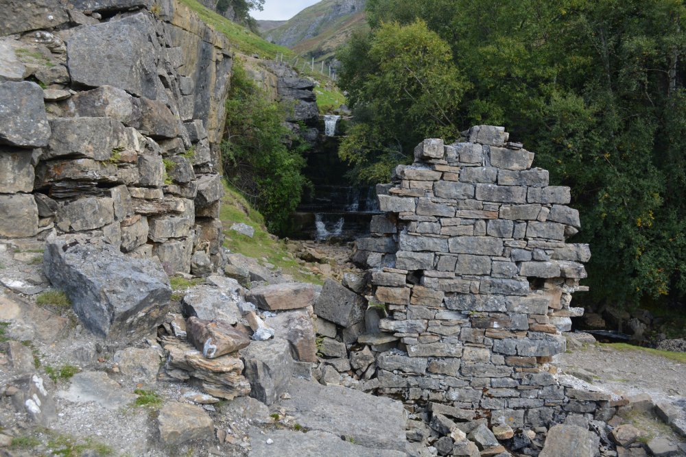 Ruined buildings from lead mining at Swinner Gill Muker to Keld Walk, Swaledale, North Yorkshire, England