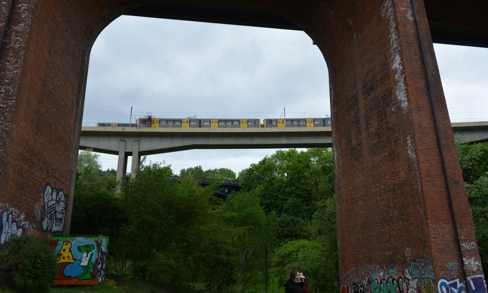 The Byker Bridge and beyond a Metro train passing over the Byker viaduct.
