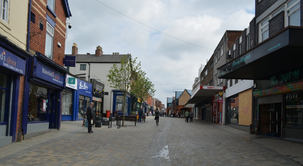 Views of Eccleston Street, Prescot, the main original shopping street, dating from at least the 18th century.