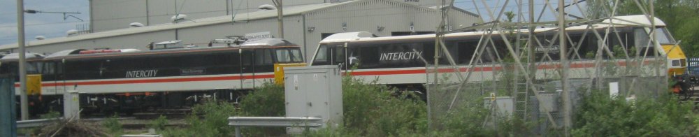 Class 87 electric locomotive 87001 named 'National Railway Museum' InterCity Swallow livery (near Crewe Station May 2024)
