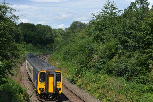 2-car Class 156 unit 156487 arriving and leaving Shildon Station, with a Northern Rail service from Saltburn to Bishop Auckland, 2024