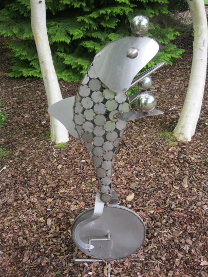 The metal fish sculpture in Breezy Knees Gardens, near York, North Yorkshire