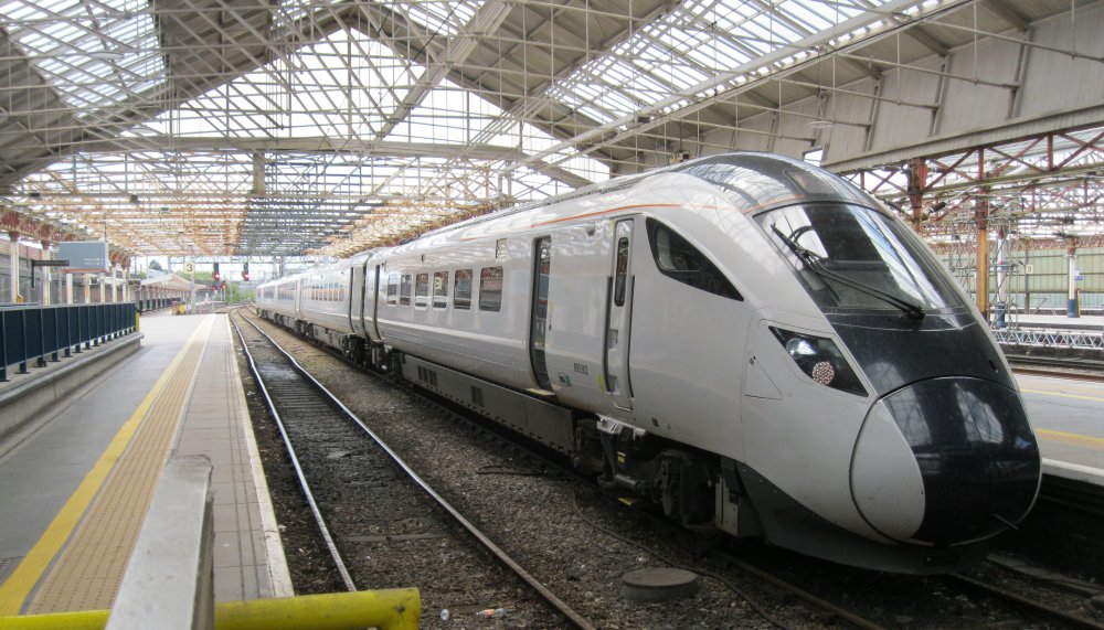 The front end of the 5-car Class 805 bi-mode unit 805004, unbranded, on a test run at Crewe Station (2024)